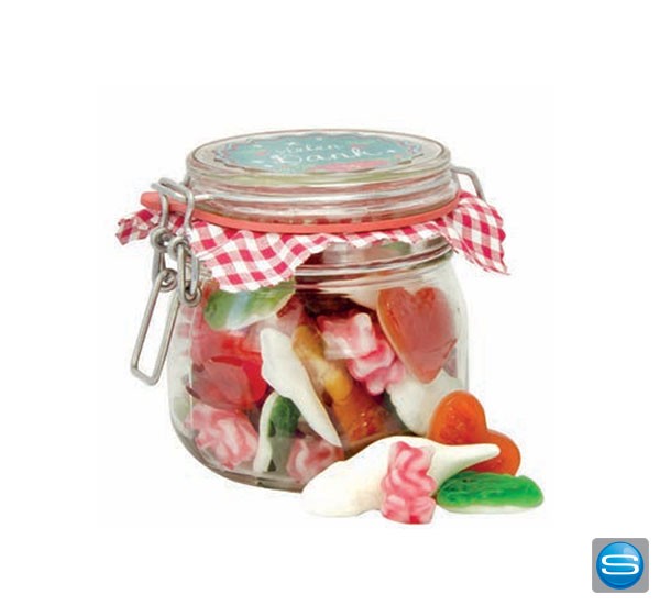 Gefülltes Marmeladenglas mit Süßigkeiten zu Weihnachten