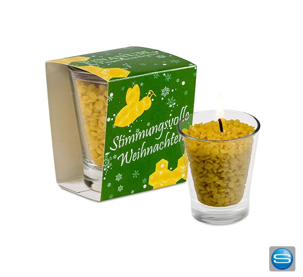 Kerzenglas mit Bienenwachsgranulat verpackt mit einer bedruckten Banderole