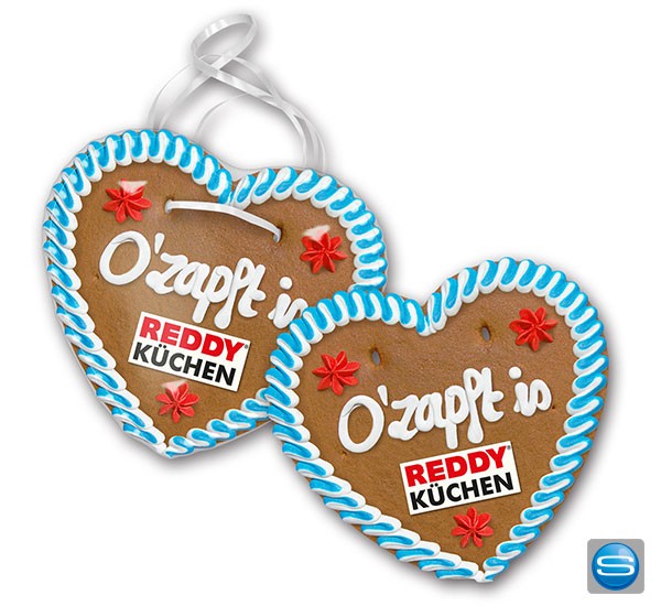 Lebkuchenherz als Give Away mit Marzipanlogo und Schriftzug
